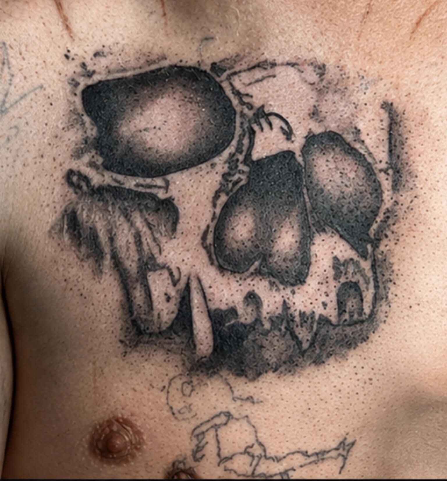 Bold blackwork illustrative tattoo