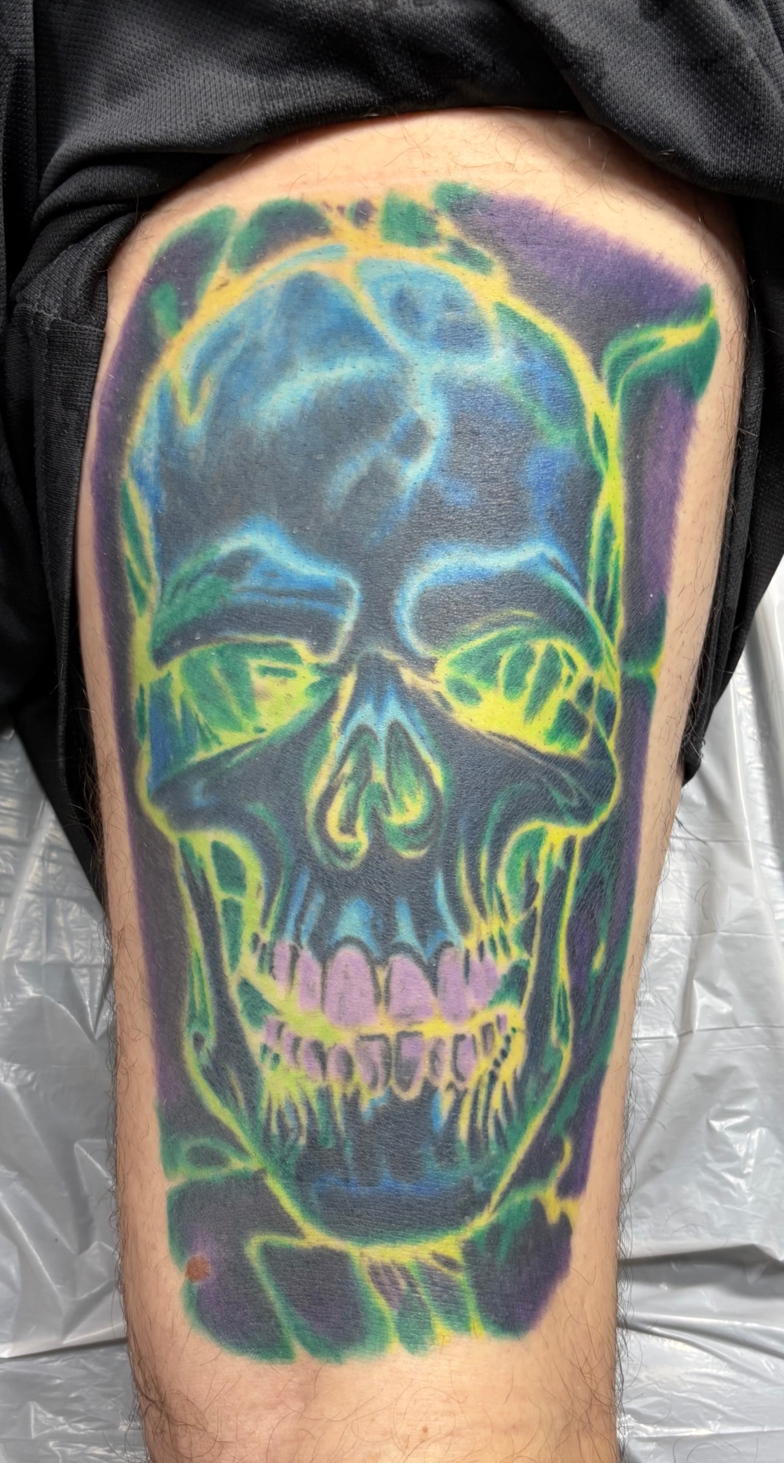 Randy DeShong colorful skull tattoo