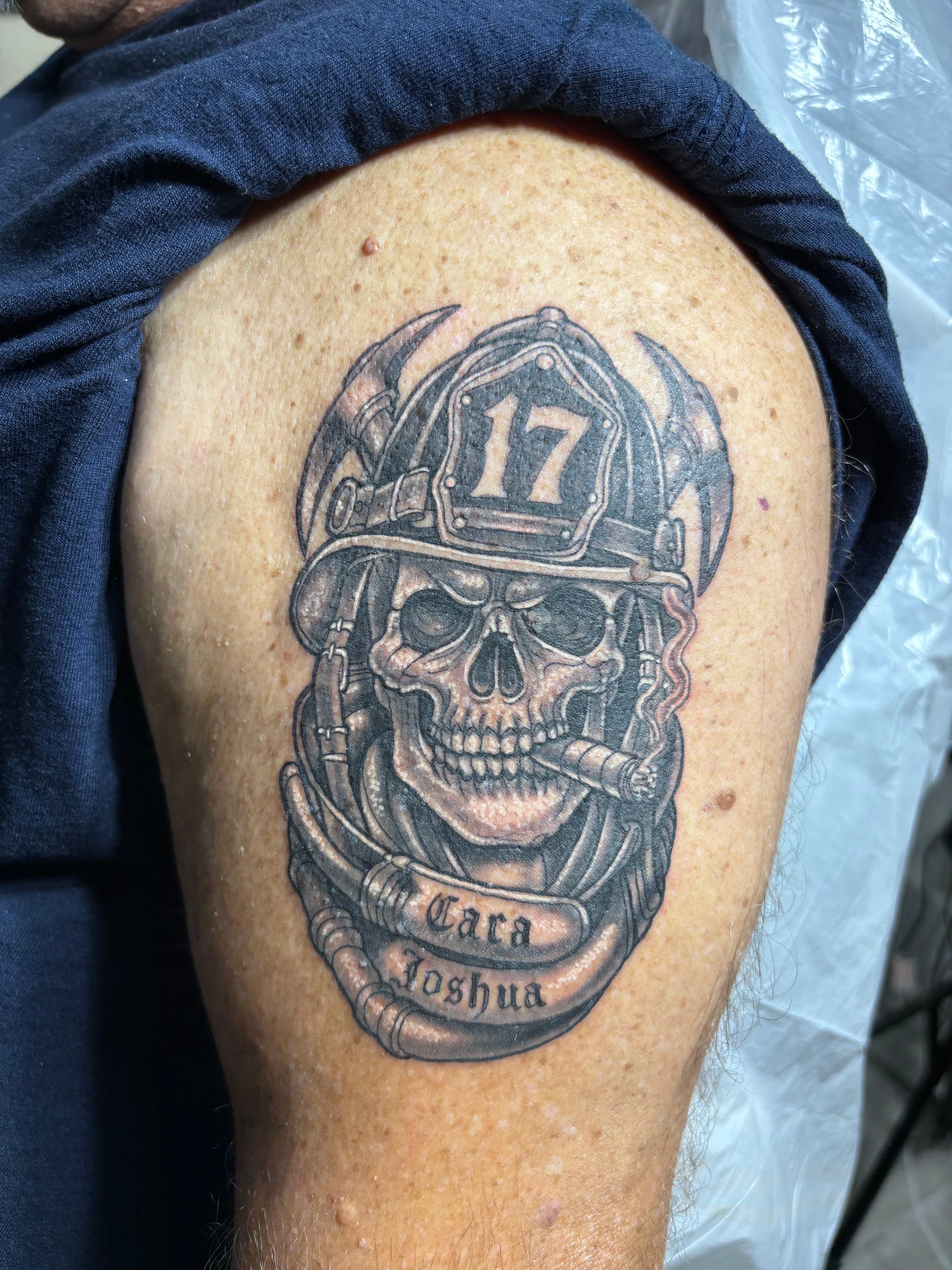 Black and grey sleeve tattoo