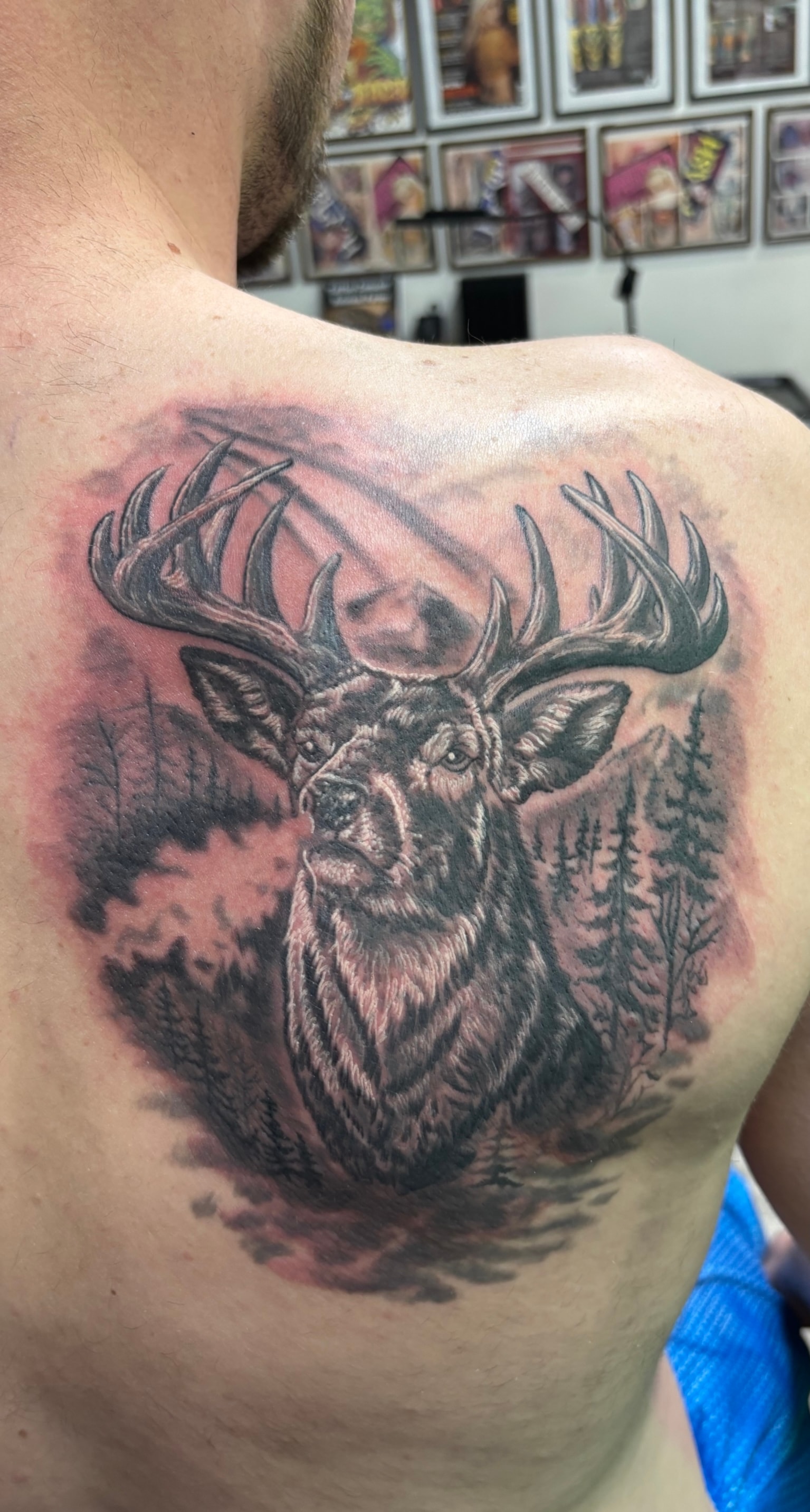 Randy DeShong deer and forest back tattoo