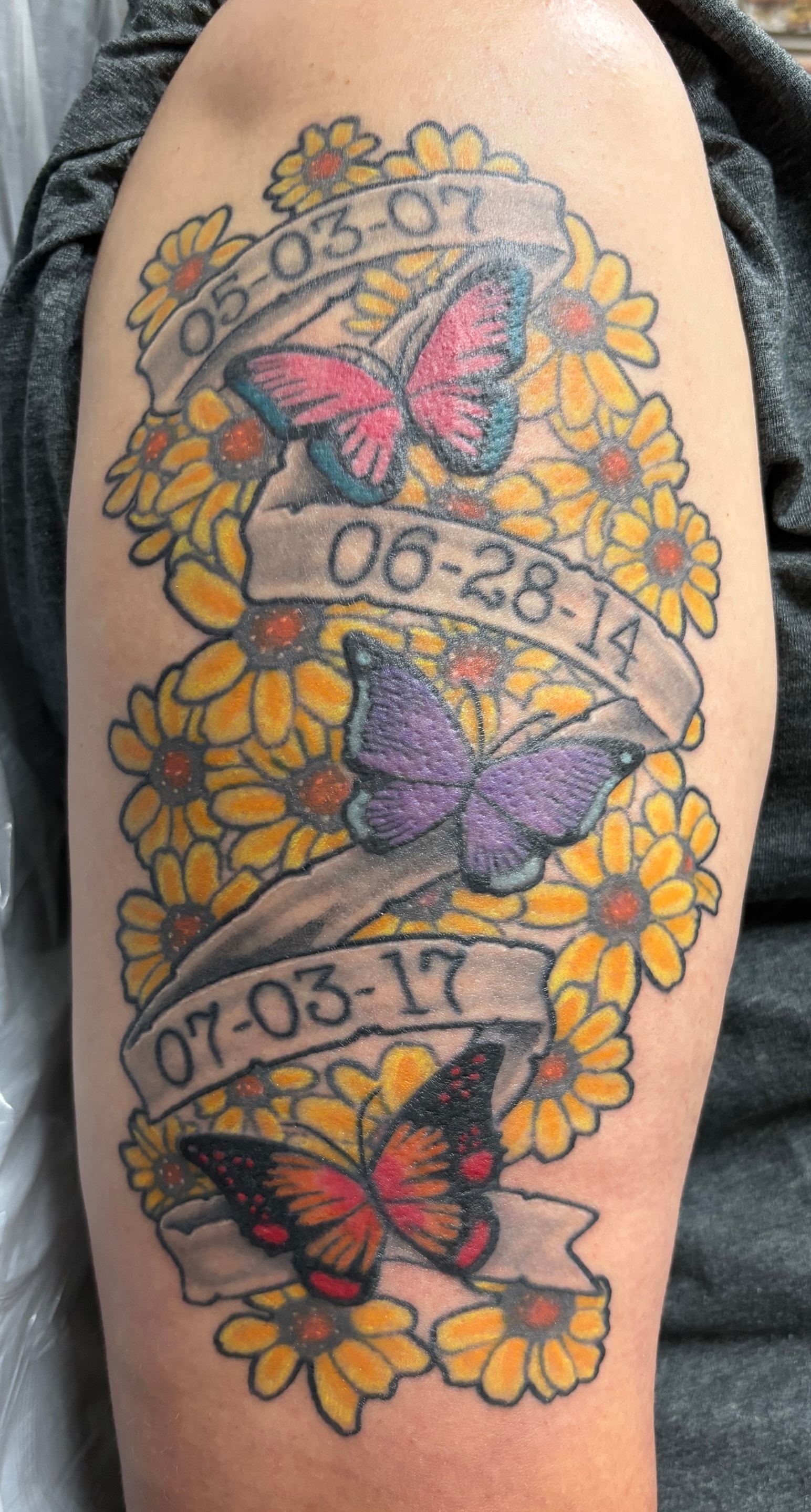 Randy DeShong butterflies sunflowers and dates memorial tattoo