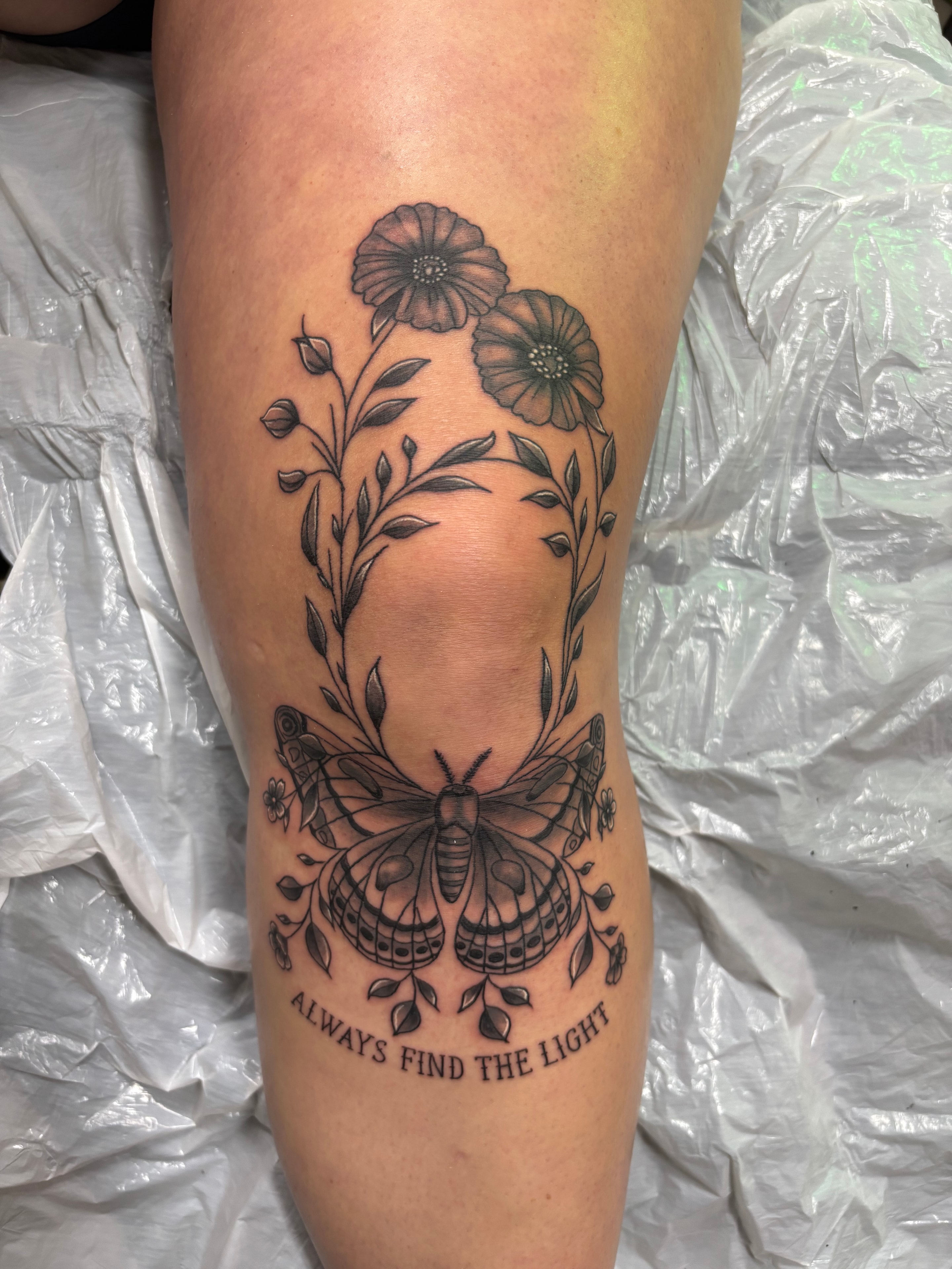 Randy DeShong moth flowers Always Find the Light tattoo
