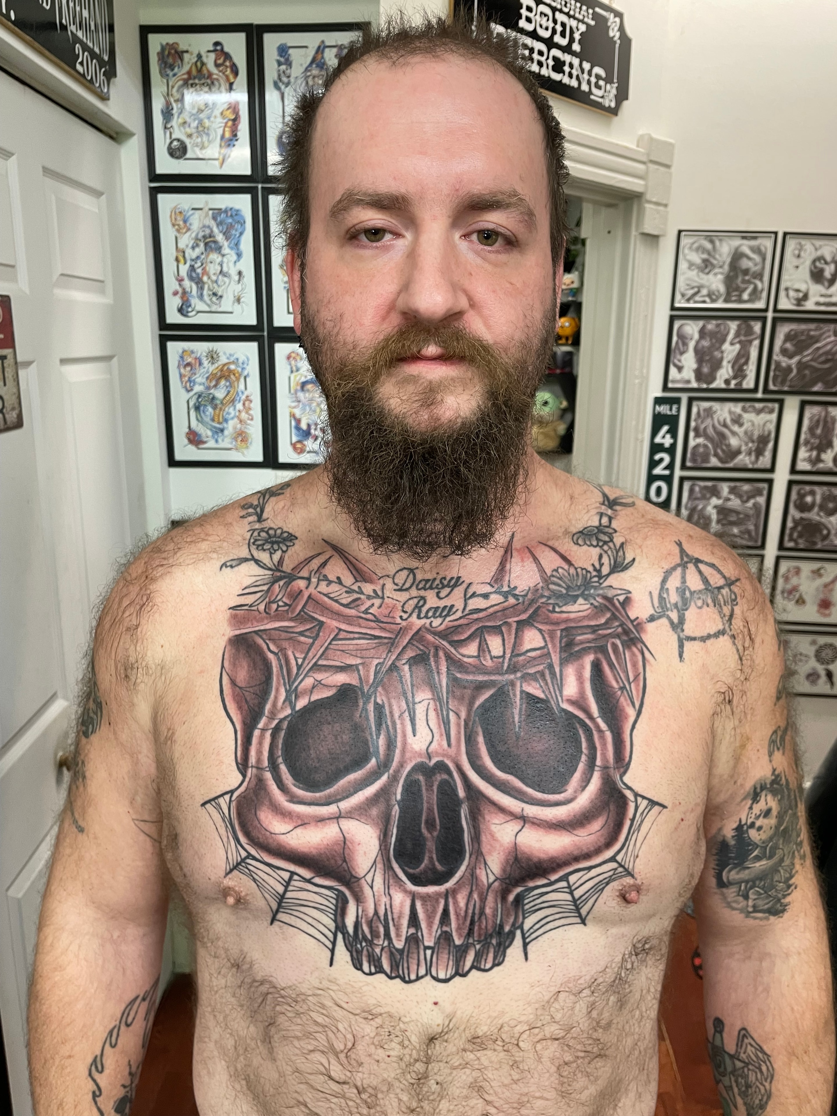 Randy DeShong large skull chest piece tattoo