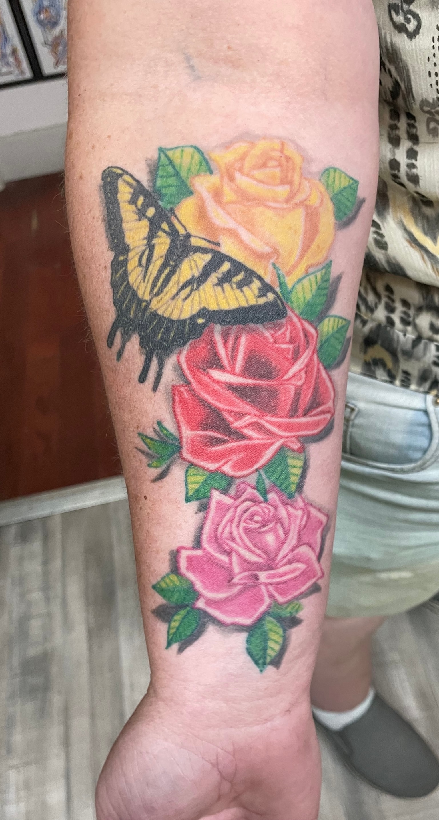 Black and grey rose tattoo