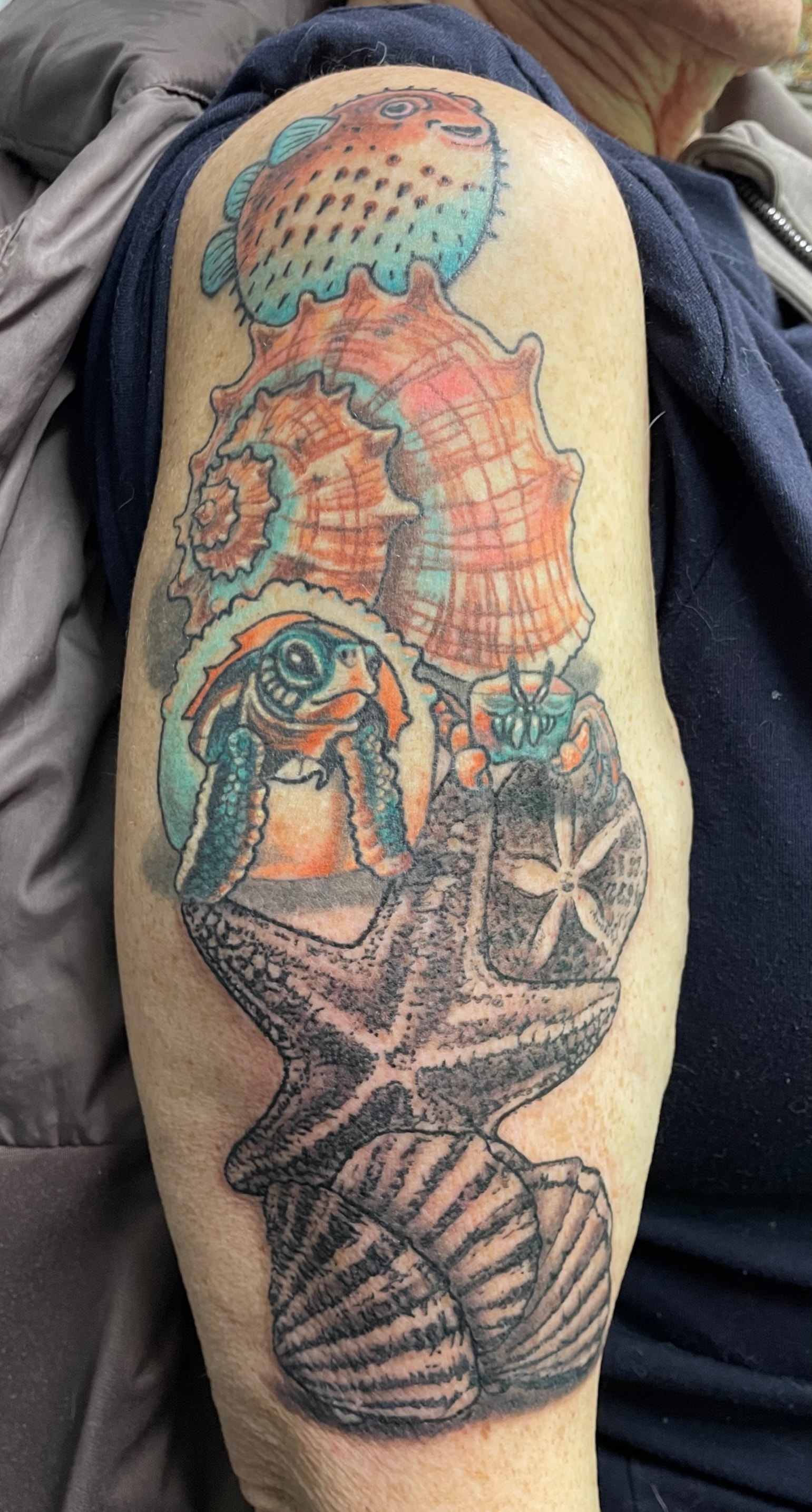 Randy DeShong colorful sea creatures tattoo